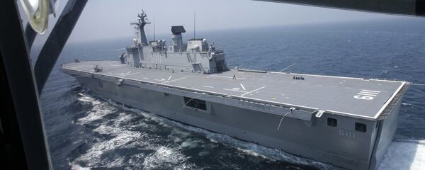 The South Korean navy's 14,000 ton-class large-deck landing ship Dokdo sails through the Yellow Sea of South Korea during military drills, Thursday, Aug. 5, 2010. The South Korean navy's 14,000 ton-class large-deck landing ship Dokdo sails through the Yellow Sea of South Korea during military drills, Thursday, Aug. 5, 2010. - Sputnik International