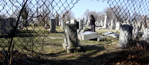 Scores of volunteers are expected to help in an organized effort to clean up and restore the Jewish cemetery where vandals damaged hundreds of headstones - Sputnik International