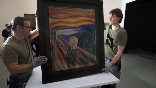 In this photo taken on Wednesday, March 18, 2015, employees present the painting The Scream by Edvard Munch, prior to it being exhibited, at the Louis Vuitton Foundation in Paris, France. - Sputnik International