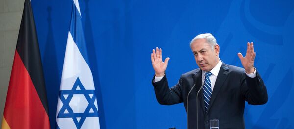 Israel's Prime Minister Benjamin Netanyahu gestures during a news coneference together with German chancellor Angela Merkel during the German-Israeli government consultations at the Chancellery in Berlin,  Tuesday Feb. 16, 2016. - Sputnik International