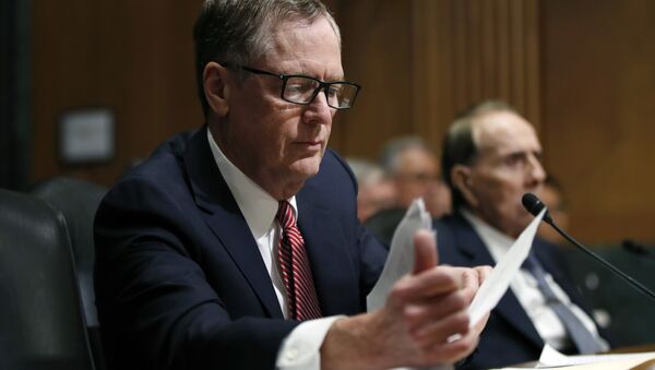 FILE - In this Tuesday, March 14, 2017, file photo, United States Trade Representative-nominee Robert Lighthizer, foreground, looks at documents during his confirmation hearing on Capitol Hill in Washington - Sputnik International