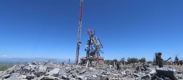 Members of the Kurdish People's Protection Units (YPG) inspect the damage at their headquarters after it was hit by Turkish airstrikes in Mount Karachok near Malikiya, Syria April 25, 2017 Members of the Kurdish People's Protection Units (YPG) inspect the damage at their headquarters after it was hit by Turkish airstrikes in Mount Karachok near Malikiya, Syria April 25, 2017 - Sputnik International