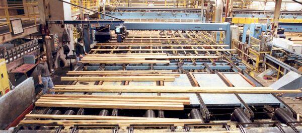 Workers prepare lumber inside Weyerhaeuser's Port Alberni Mill on Vancouver Island in British Columbia (File) Workers prepare lumber inside Weyerhaeuser's Port Alberni Mill on Vancouver Island in British Columbia (File) - Sputnik International