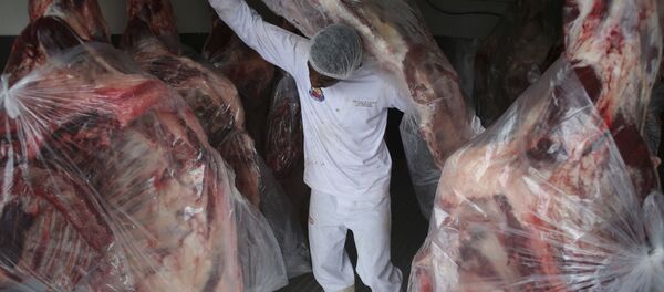 A man delivers sides of beaf to meat to a butcher shop in Brasilia, Brazil, Monday, March 20, 2017 A man delivers sides of beaf to meat to a butcher shop in Brasilia, Brazil, Monday, March 20, 2017 - Sputnik International