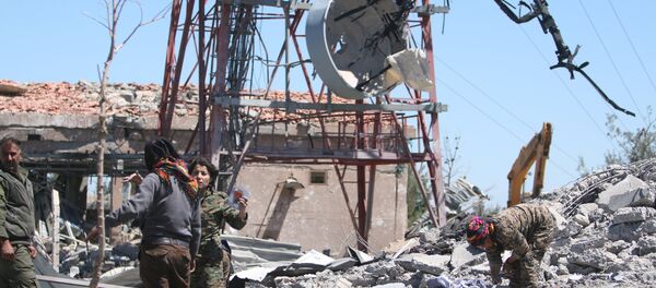 Fighters from the Kurdish People's Protection Units (YPG) inspect the damage at their headquarters after it was hit by Turkish airstrikes in Mount Karachok near Malikiya, Syria April 25, 2017 Fighters from the Kurdish People's Protection Units (YPG) inspect the damage at their headquarters after it was hit by Turkish airstrikes in Mount Karachok near Malikiya, Syria April 25, 2017 - Sputnik International