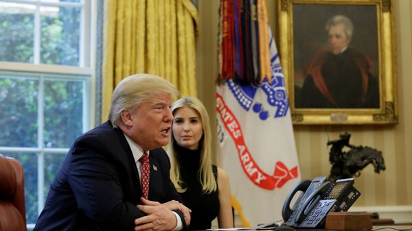 U.S. President Donald Trump and his daughter Ivanka hold a video conference call with Commander Peggy Whitson and Flight Engineer Jack Fischer of NASA on the International Space Station from the Oval Office of the White House in Washington, U.S., April 24, 2017 - Sputnik International