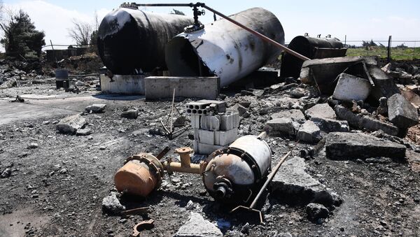 Aftermath of US missile attack on Ash Sha'irat airbase in Syria. File photo - Sputnik International