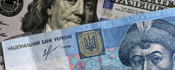 US dollar and Ukrainian hryvnia notes US dollar and Ukrainian hryvnia notes - Sputnik International
