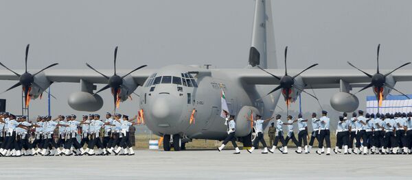 Indian Air Force personnel march past a C-130 J Hercules aircraft during parade rehearsals for Air Force Day at the Air Force Station in Hindon, on the outskirts of New Delhi, India (File) Indian Air Force personnel march past a C-130 J Hercules aircraft during parade rehearsals for Air Force Day at the Air Force Station in Hindon, on the outskirts of New Delhi, India (File) - Sputnik International