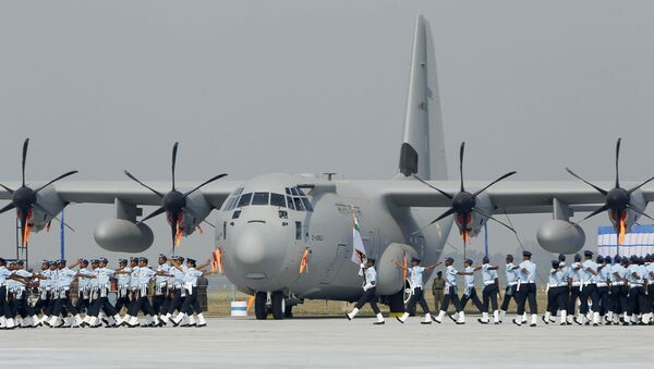 Indian Air Force personnel march past a C-130 J Hercules aircraft during parade rehearsals for Air Force Day at the Air Force Station in Hindon, on the outskirts of New Delhi, India (File) - Sputnik International