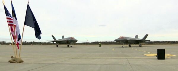 In this image made from video, two F35A fighter jets sit on the tarmac at the Amari Airbase in Harjumaa, Estonia, Tuesday, April 25, 2017 - Sputnik International
