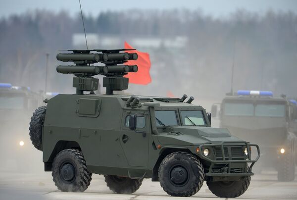 A Tiger armored vehicle with the Cornet anti-tank missile system during the joint Victory Parade drills of the combined parade unit, mechanized column and lineup of aircraft A Tiger armored vehicle with the Cornet anti-tank missile system during the joint Victory Parade drills of the combined parade unit, mechanized column and lineup of aircraft - Sputnik International
