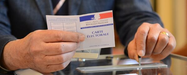 Voting during the first round of France's presidential election at a polling station in Le Touquet commune of the Pas-de-Calais department. File photo Voting during the first round of France's presidential election at a polling station in Le Touquet commune of the Pas-de-Calais department. File photo - Sputnik International
