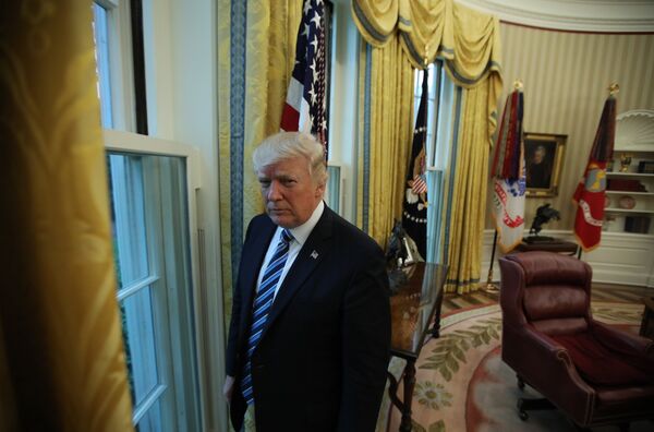 U.S. President Donald Trump stands in the Oval Office following an interview with Reuters at the White House in Washington, U.S., April 27, 2017 U.S. President Donald Trump stands in the Oval Office following an interview with Reuters at the White House in Washington, U.S., April 27, 2017 - Sputnik International