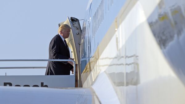 Trump walks up the steps the steps of Air Force One at Palm Beach International Airport in West Palm Beach, Fla. - Sputnik International