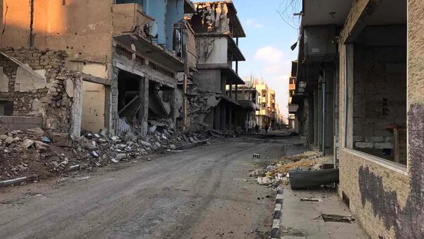 Buildings destroyed during combat activities in the residential part in Homs, Syria. (File) - Sputnik International
