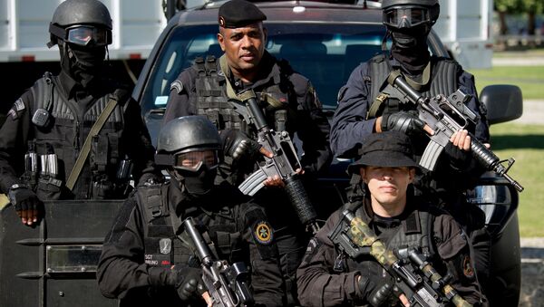 Members of the Battalion of Special Police Operations (BOPE) pose during the presentation of security forces for the upcoming FIFA World Cup, in Flamengo beach in Rio de Janeiro. (File) - Sputnik International