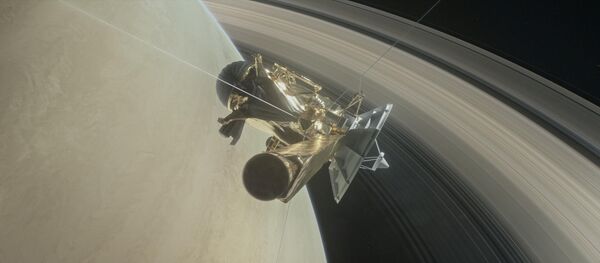 This illustration of NASA's Cassini spacecraft about to make one of its dives between Saturn and its innermost rings as part of the mission's grand finale. This illustration of NASA's Cassini spacecraft about to make one of its dives between Saturn and its innermost rings as part of the mission's grand finale. - Sputnik International