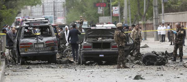 Security forces inspect the site of a suicide attack in Kabul, Afghanistan, Wednesday, May 3 , 2017 Security forces inspect the site of a suicide attack in Kabul, Afghanistan, Wednesday, May 3 , 2017 - Sputnik International
