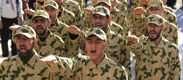 Hezbollah fighters parade during a ceremony to honor fallen comrades, in Tefahta village, south Lebanon, Saturday, Feb. 18, 2017. Hezbollah fighters parade during a ceremony to honor fallen comrades, in Tefahta village, south Lebanon, Saturday, Feb. 18, 2017. - Sputnik International