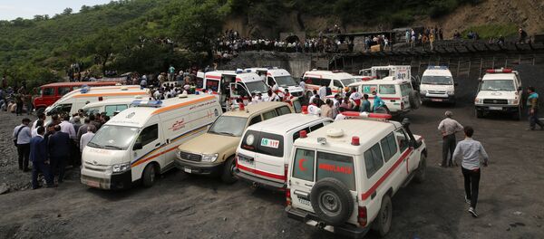 Rescue workers gather at the scene following an explosion in a coal mine in Azadshahr, in northern Iran, leaving dozens of miners trapped on May 3, 2017 Rescue workers gather at the scene following an explosion in a coal mine in Azadshahr, in northern Iran, leaving dozens of miners trapped on May 3, 2017 - Sputnik International