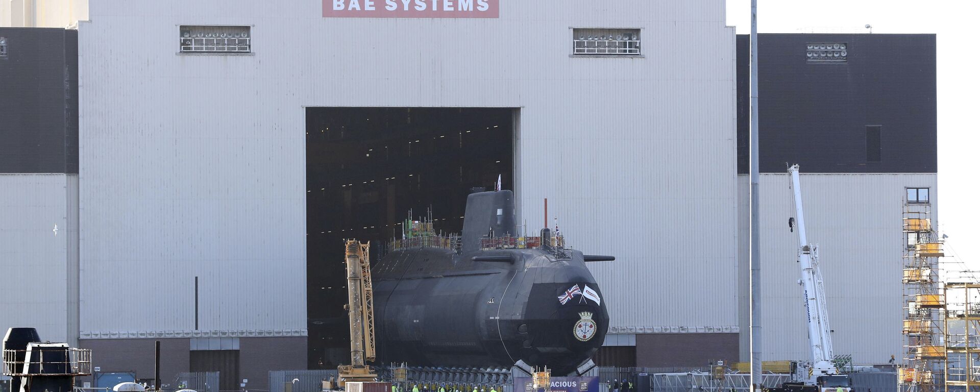 HMS Audacious, the fourth Astute-class nuclear-powered submarine of the Royal Navy, is taken out of the indoor ship building complex at BAE Systems, Burrow-in-Furness, England, Thursday April 27, 2017. - Sputnik International, 1920, 02.11.2024
