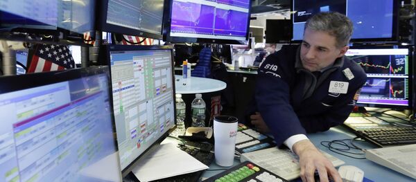 Specialist Anthony Rinaldi works at his post on the floor of the New York Stock Exchange, Tuesday, March 14, 2017 - Sputnik International
