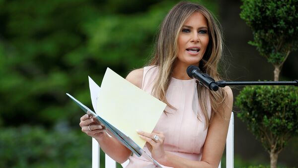 U.S. first lady Melania Trump reads the children's book Party Animals at the 139th annual White House Easter Egg Roll on the South Lawn of the White House in Washington, U.S., April 17, 2017 - Sputnik International