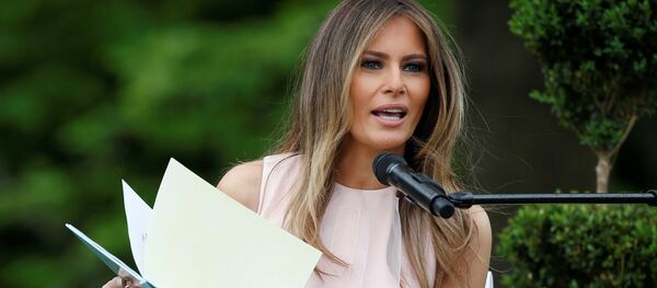 U.S. first lady Melania Trump reads the children's book Party Animals at the 139th annual White House Easter Egg Roll on the South Lawn of the White House in Washington, U.S., April 17, 2017 - Sputnik International