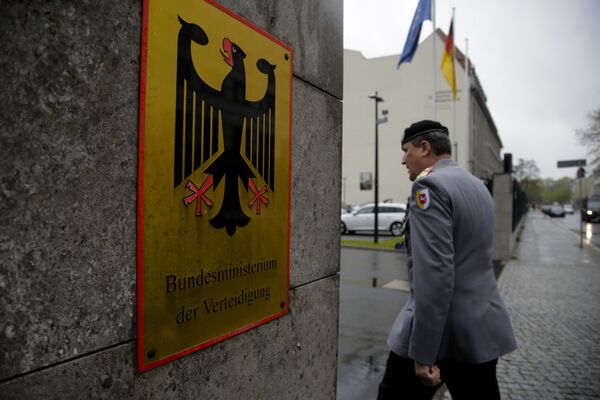 A German forces Bundeswehr officer enters the German Defense Ministry prior to a meeting between Defense Minister Ursula von der Leyen and about 100 top officers in Berlin, Thursday, May 4, 2017.  - Sputnik International