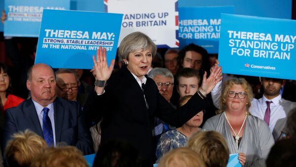 Britain's Prime Minister Theresa May delivers a speech to Conservative Party members in Mawdesley village hall, Ormskirk, Britain May 1, 2017 - Sputnik International