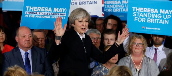 Britain's Prime Minister Theresa May delivers a speech to Conservative Party members in Mawdesley village hall, Ormskirk, Britain May 1, 2017 - Sputnik International