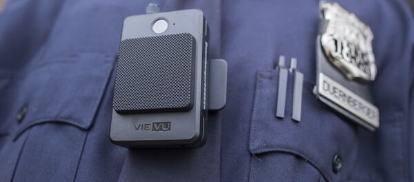 A police officer wears a newly issued body camera outside the 34th precinct, Thursday, April 27, 2017, in New York. - Sputnik International