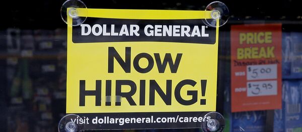 In this Wednesday, May 18, 2016, photo, a Now Hiring sign hangs in the window of a Dollar General store in Methuen, Mass. - Sputnik International