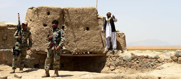 Afghan Border Police personnel keep watch during an ongoing battle between Pakistani and Afghan Border forces near the Durand line at Spin Boldak, in southern Kandahar province on May 5, 2017 Afghan Border Police personnel keep watch during an ongoing battle between Pakistani and Afghan Border forces near the Durand line at Spin Boldak, in southern Kandahar province on May 5, 2017 - Sputnik International