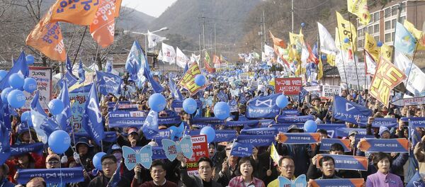 Protesters stage a rally to oppose the deployment of US Terminal High-Altitude Area Defense (THAAD) missile defence system in Seongju in South Korea Protesters stage a rally to oppose the deployment of US Terminal High-Altitude Area Defense (THAAD) missile defence system in Seongju in South Korea - Sputnik International