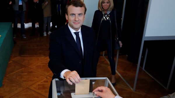 French presidential election candidate Emmanuel Macron, head of the political movement En Marche !, or Onwards ! casts his ballot at a polling station during the the second round of 2017 French presidential election, in Le Touquet, France, May 7, 2017. - Sputnik International