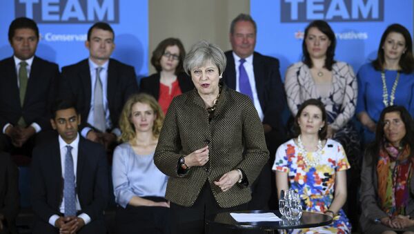 Britain's Prime Minister Theresa May speaks at the Dhamecha Lohana Centre in north west London, where she is meeting Conservative party general election candidates from across London and the south east of England, Monday May 8, 2017. Britain will hold a general election on June 8 - Sputnik International