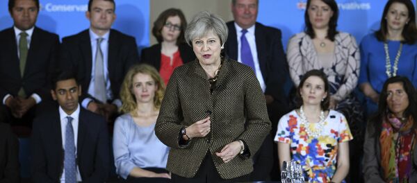 Britain's Prime Minister Theresa May speaks at the Dhamecha Lohana Centre in north west London, where she is meeting Conservative party general election candidates from across London and the south east of England, Monday May 8, 2017. Britain will hold a general election on June 8 - Sputnik International