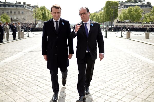 Outgoing French President Francois Hollande (R) and President-elect Emmanuel Macron attend a ceremony to mark the end of World War II at the Tomb of the Unknown Soldier at the Arc de Triomphe in Paris, France, May 8, 2017. Outgoing French President Francois Hollande (R) and President-elect Emmanuel Macron attend a ceremony to mark the end of World War II at the Tomb of the Unknown Soldier at the Arc de Triomphe in Paris, France, May 8, 2017. - Sputnik International
