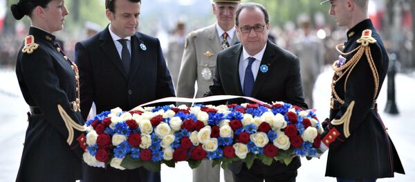 Outgoing French President Francois Hollande (R) and President-elect Emmanuel Macron attend a ceremony to mark the end of World War II at the Tomb of the Unknown Soldier at the Arc de Triomphe in Paris, France, May 8, 2017. Outgoing French President Francois Hollande (R) and President-elect Emmanuel Macron attend a ceremony to mark the end of World War II at the Tomb of the Unknown Soldier at the Arc de Triomphe in Paris, France, May 8, 2017. - Sputnik International