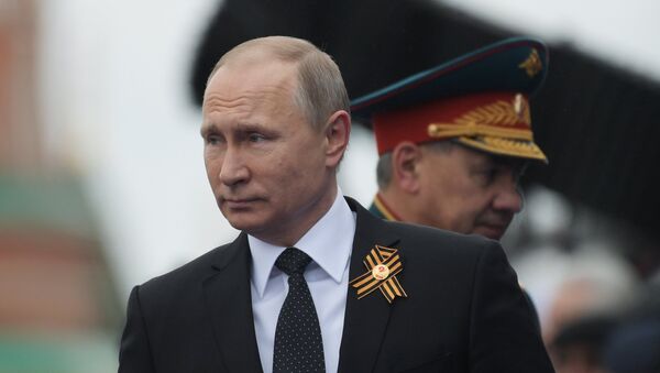 Russian President Vladimir Putin and Defense Minister Sergei Shoigu - Sputnik International