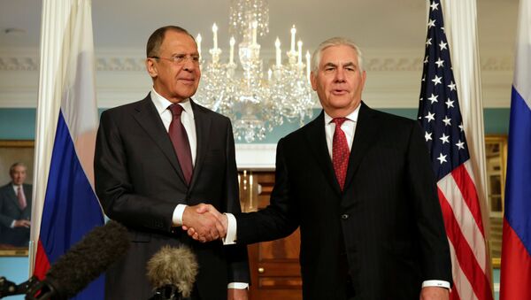 U.S. Secretary of State Rex Tillerson (R) shakes hands with Russian Foreign Minister Sergey Lavrov before their meeting at the State Department in Washington, U.S., May 10, 2017. - Sputnik International