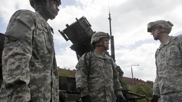 U.S. soldiers stands next to a Patriot surface-to-air missile battery. (File) - Sputnik International
