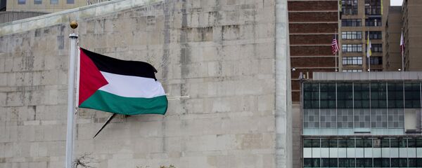 The Palestinian flag flies in the wind after a Rose Garden ceremony at the United Nations headquarters The Palestinian flag flies in the wind after a Rose Garden ceremony at the United Nations headquarters - Sputnik International