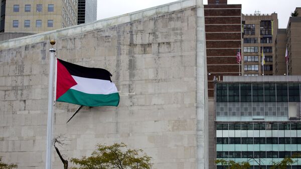 The Palestinian flag flies in the wind after a Rose Garden ceremony at the United Nations headquarters - Sputnik International