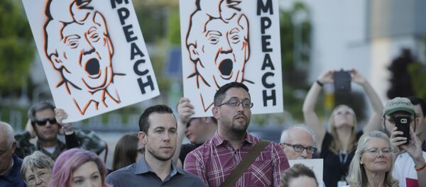 People look on during a healthcare rally Thursday, May 4, 2017, in Salt Lake City. Utah's all-Republican House delegation voted Thursday in favor of a health care overhaul that could impact people with pre-existing conditions, triggering serious worries from people who fit that category. - Sputnik International
