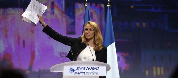 Marion Marechal-Le Pen, French National Front political party deputy, attends a political rally as she campaigns for Marine Le Pen, French National Front (FN) political party leader and candidate for the French 2017 presidential election, in Marseille, France, April 19, 2017 Marion Marechal-Le Pen, French National Front political party deputy, attends a political rally as she campaigns for Marine Le Pen, French National Front (FN) political party leader and candidate for the French 2017 presidential election, in Marseille, France, April 19, 2017 - Sputnik International