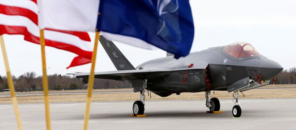 U.S., Estonia's and NATO flags flutter next to the U.S. Air Force F-35A Lightning II fighter in Amari air base, Estonia, April 25, 2017 U.S., Estonia's and NATO flags flutter next to the U.S. Air Force F-35A Lightning II fighter in Amari air base, Estonia, April 25, 2017 - Sputnik International