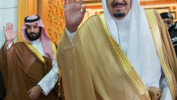 In this photo released by the Saudi Press Agency, SPA, Saudi King Salman, right, and Defense Minister and Deputy Crown Prince Mohammed bin Salman wave as they leave the hall after talks with the British prime minister, in Riyadh, Saudi Arabia, Wednesday, April 5, 2017. - Sputnik International